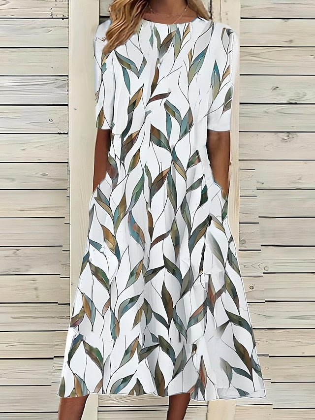 Céleste | Robe d'été mi-longue à col rond et motif floral côtier 