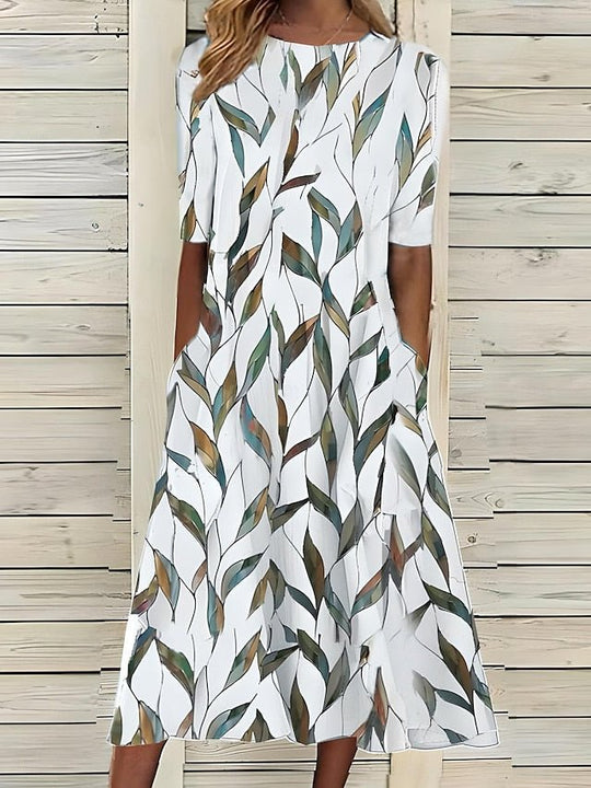Céleste | Robe d'été mi-longue à col rond et motif floral côtier 