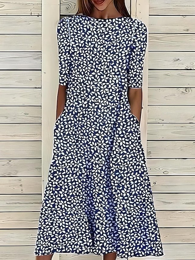 Céleste | Robe d'été mi-longue à col rond et motif floral côtier 