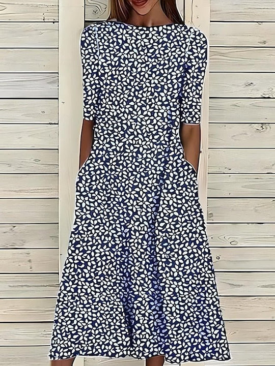Céleste | Robe d'été mi-longue à col rond et motif floral côtier 