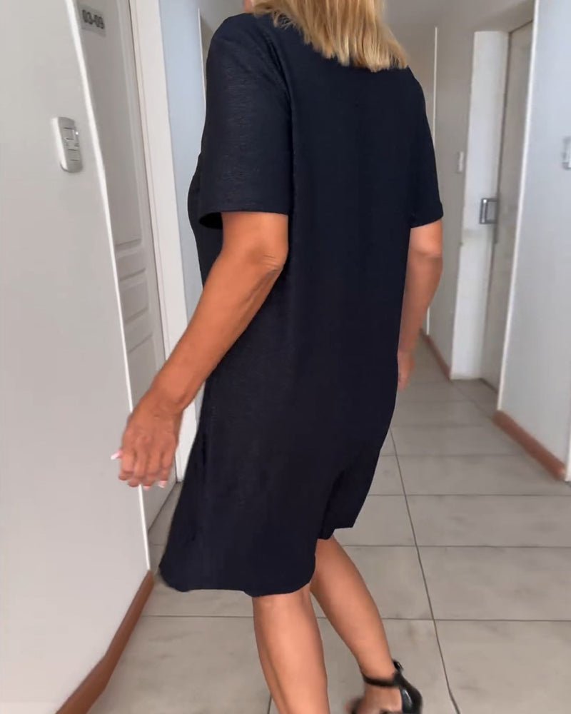 Robe à col en V torsadé et manches courtes
