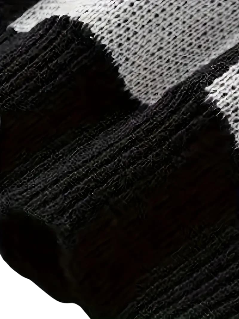 Oskar | Tricot de créateur