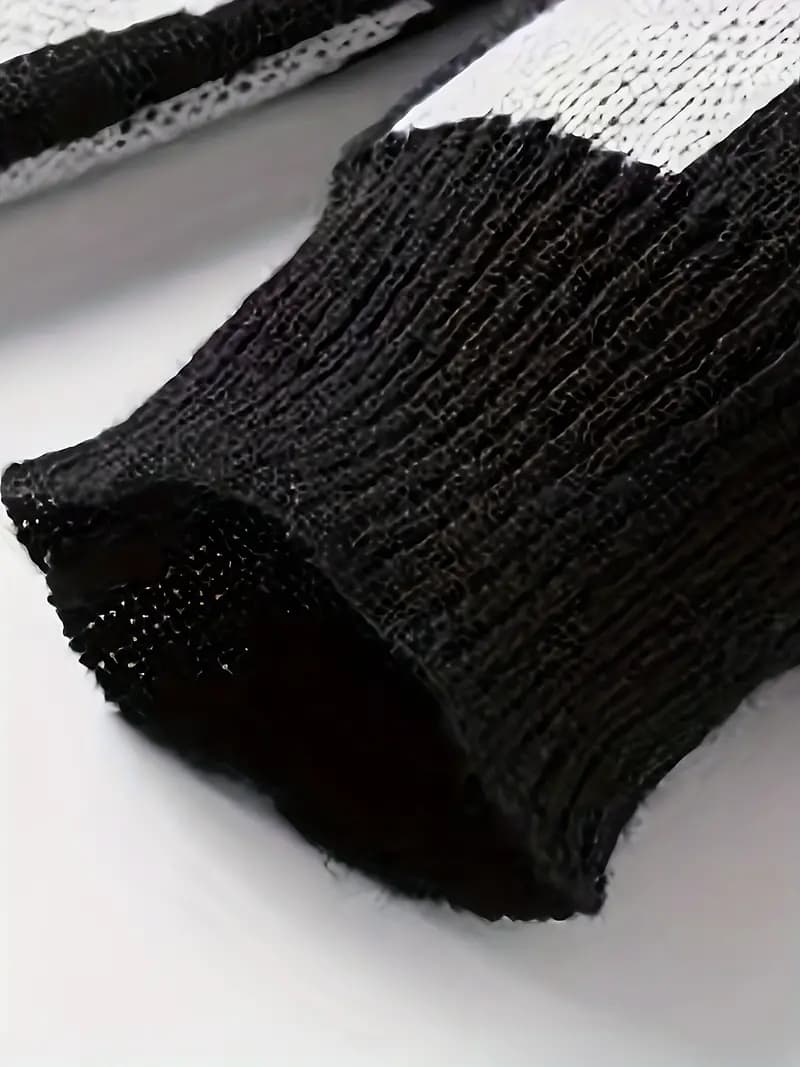 Oskar | Tricot de créateur