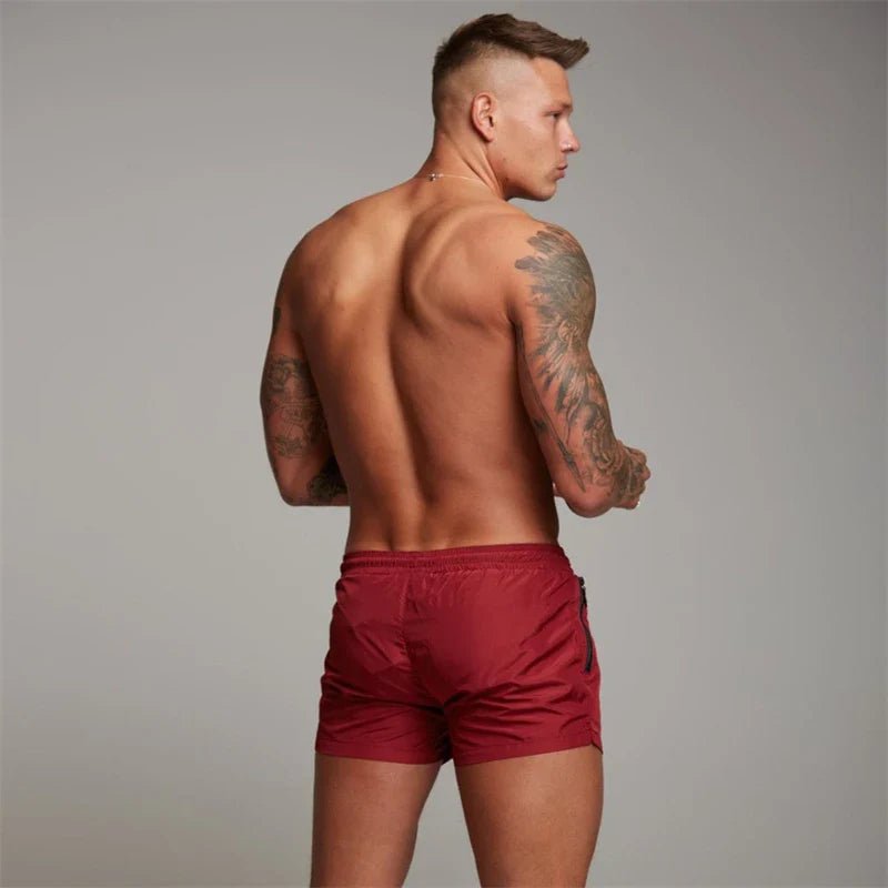 Short de bain avec poches zippées